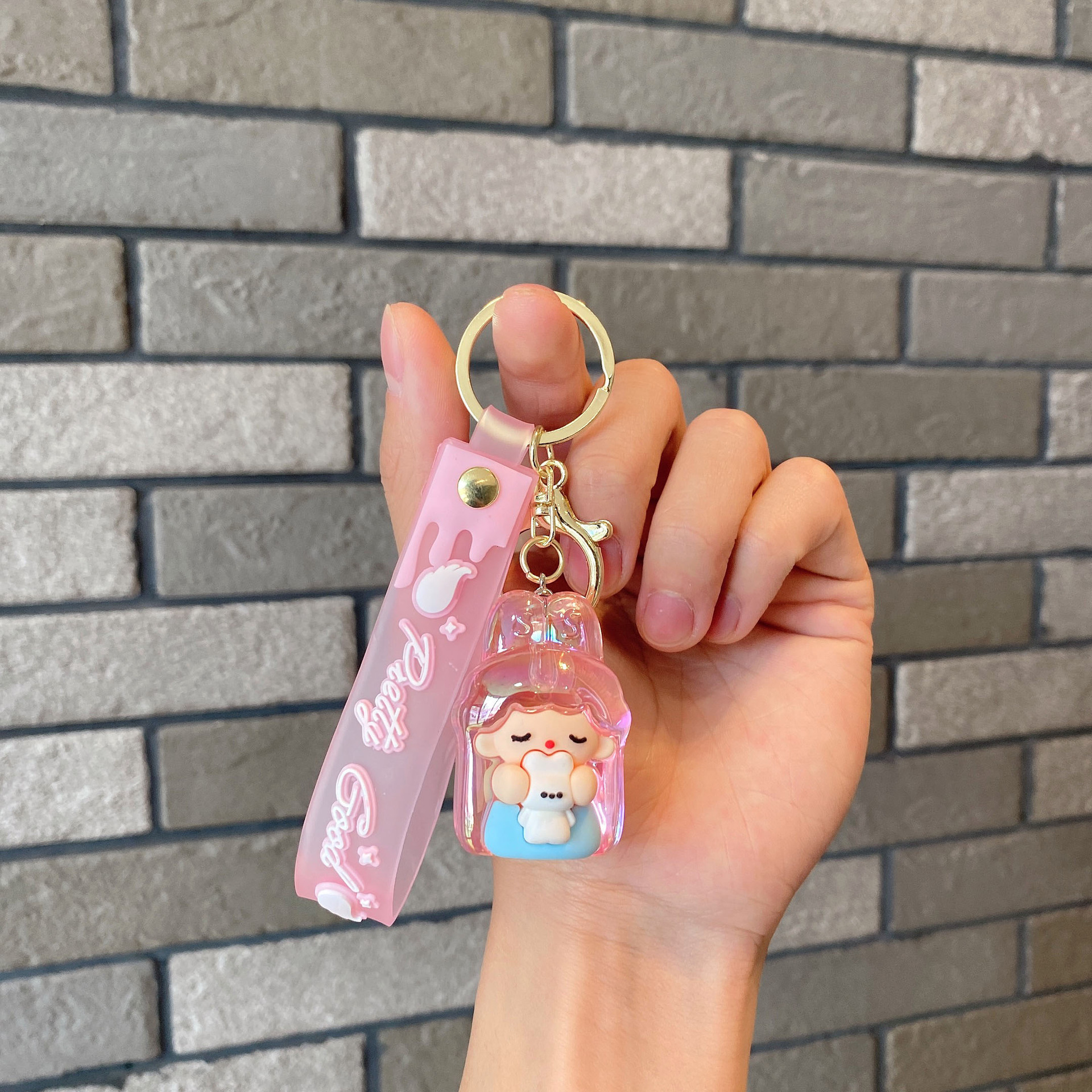 Acrílico transparente UV colorido dibujos animados lindos orejas de conejo llavero colgante pareja pequeña bolsa de regalo accesorios