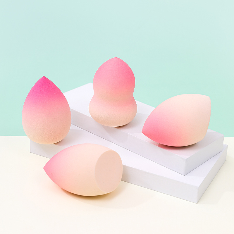 Fábrica personalizada de color degradado transfronterizo maquillaje de belleza soplo de huevo no come polvo no látex color spray gota de agua esponja de maquillaje de calabaza