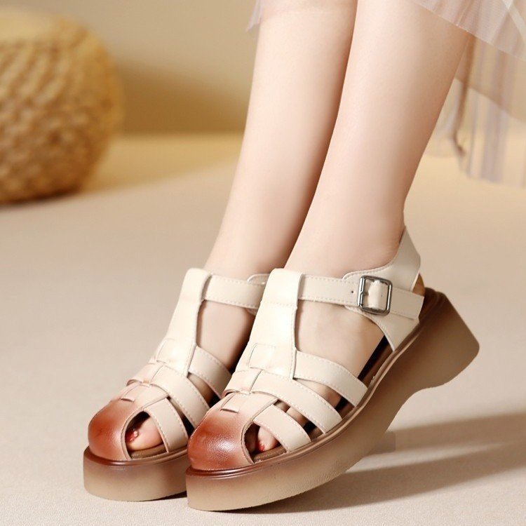 Baotou zapatos romanos sandalias trenzadas para mujeres verano 2026 nuevo fondo grueso hueco casual multifuncional zapatos de jaula de cerdo