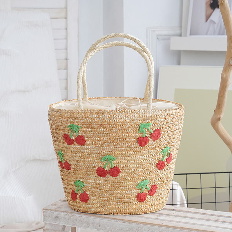 新しい夏の編みバッグ、麦わらバッグ、海辺の休暇にぴったりの編み刺繍入りレディース麦わらバッグ、インスタ映えするハンドバッグ