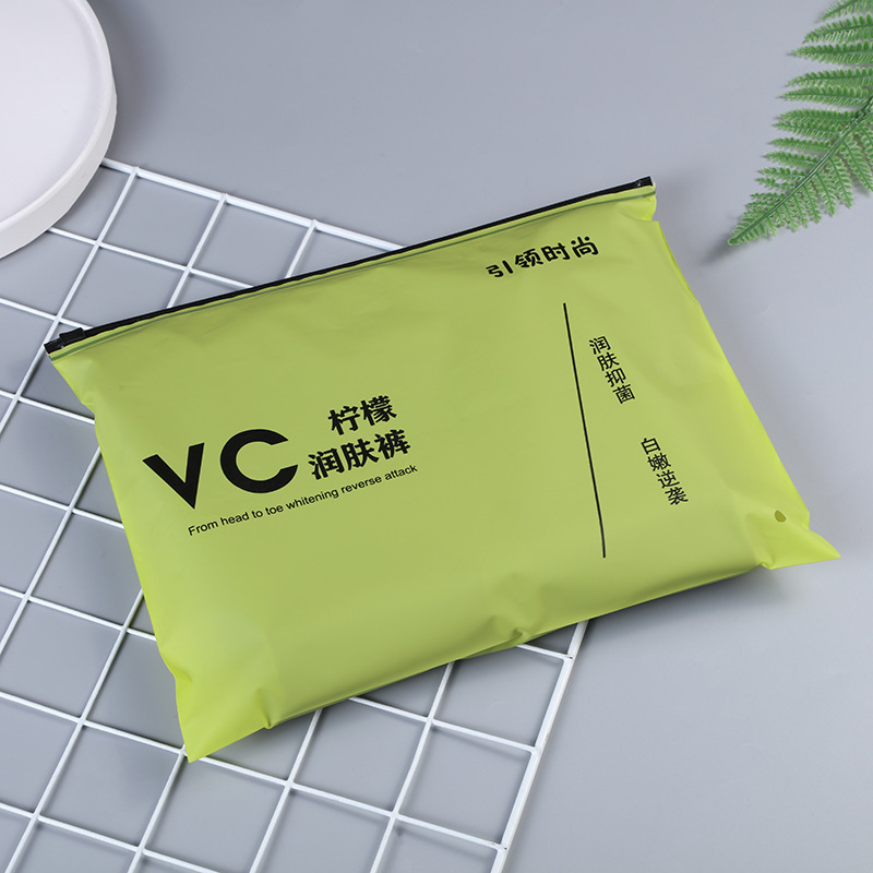 Bolsa con cremallera de ropa Bolsa con cremallera de crisantemo pequeño Bolsa de embalaje de camiseta Bolsa de ropa interior Bolsa de ropa PE esmerilada pequeña bolsa ziplock