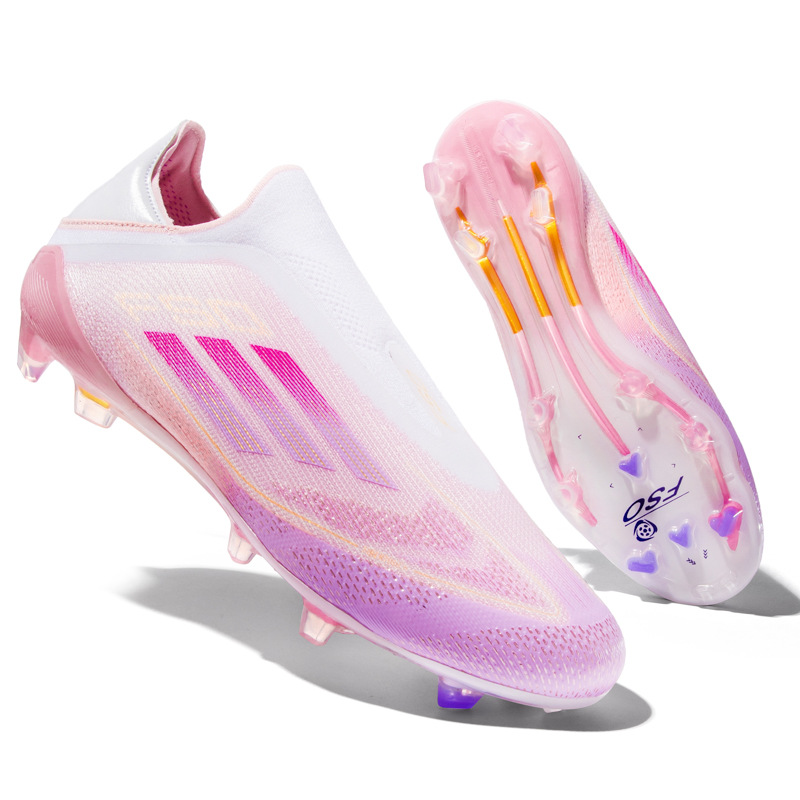 2025 nueva moda transfronteriza explosiva zapatos de fútbol de clavos largos zapatos de entrenamiento transpirables para hombres y mujeres fábrica