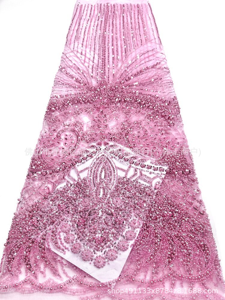 Fabrica directa de fabricación de tejido de bordado de bolsas tridimensionales franceses de alta gama vestido de boda de moda tubo de bordado de perlas tela