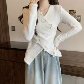 设计感交叉针织衫秋季纯欲蝴蝶毛衣不规则打底百搭洋气短款上衣女
