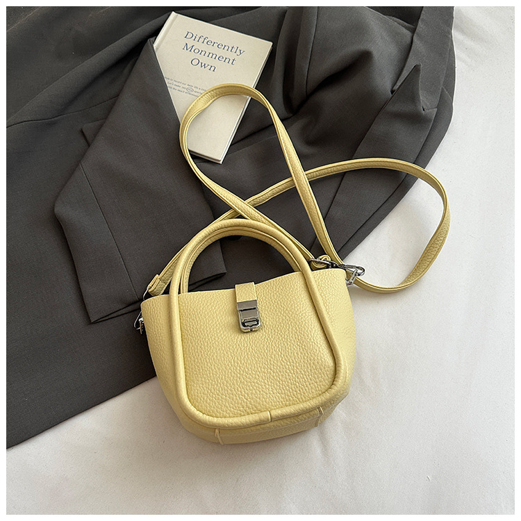 Bolso de cubo para mujer, tendencia transfronteriza de alta gama, bolso de mano con patrón de lichi, viaje diario, bolsa de mensajero de canasta de verduras de estilo occidental