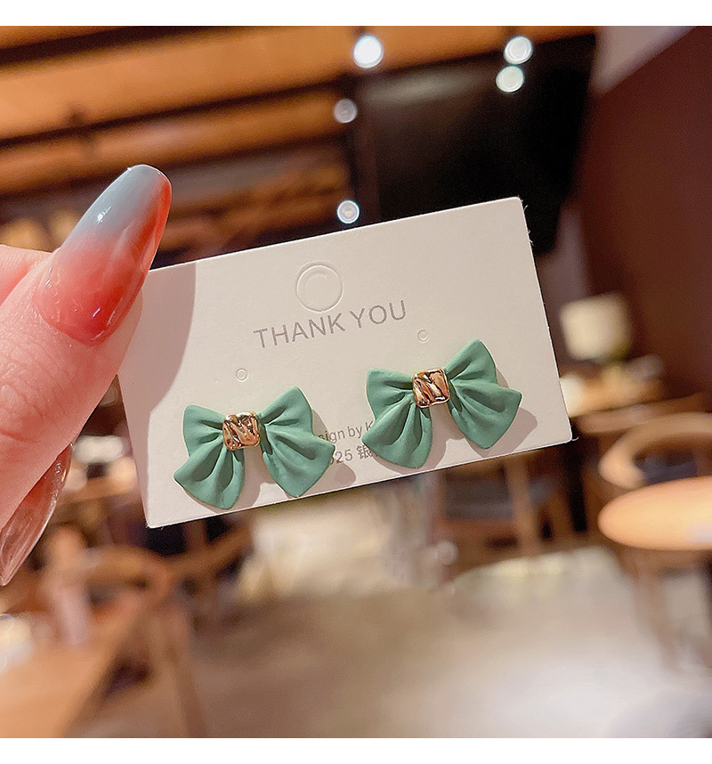 Korean Style Design Sense New Bow Earrings Simple Alloy Earrings display picture 1