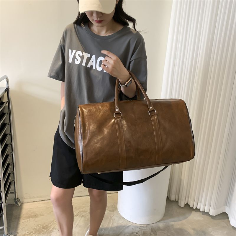 Unisex portable luggage bag women's large capacity fitness short-distance travel bag retro men's Korean-style women's boarding bag