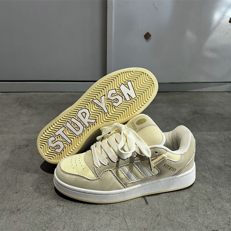 2025 nuevos estudiantes ociosos nichos hombres y mujeres parejas de skate de moda coreana in-street retro zapatos de skate de color para mujeres