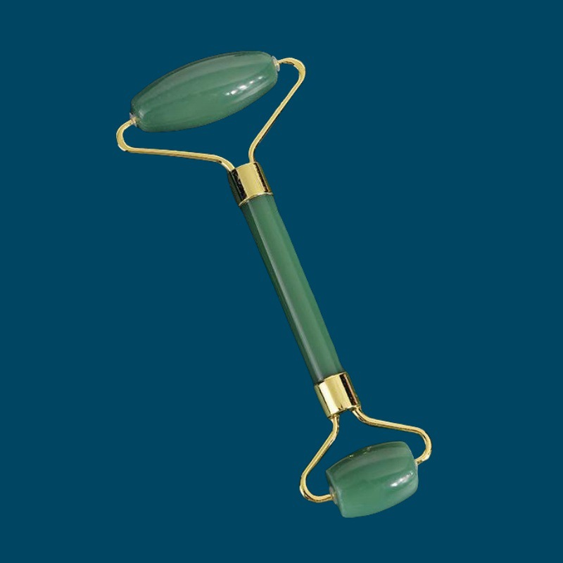 Rodillo facial de cristal en forma de corazón para masaje y lifting