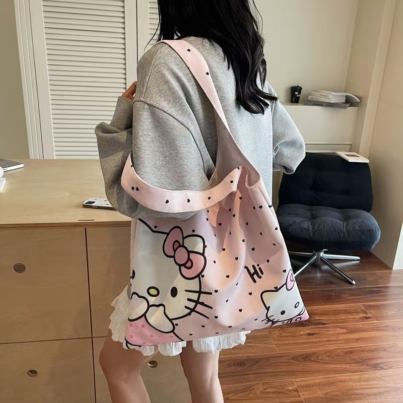 新款三丽欧大容量kitty猫开学轻便百搭外出卡通手提包休闲包单肩