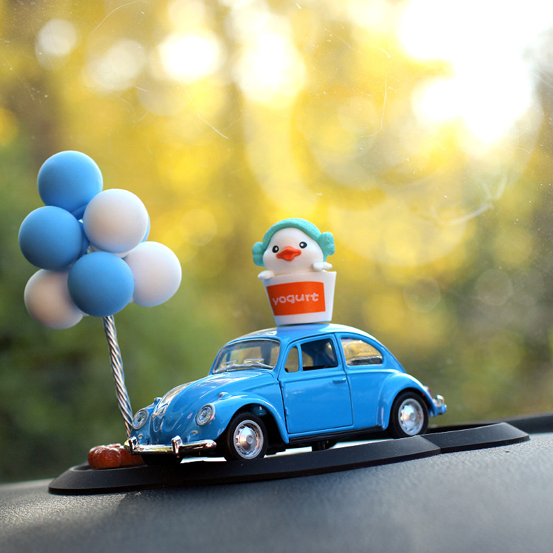 Coche creativo pequeño pato amarillo decoración del modelo del coche decoración de la consola central del coche decoración de dibujos animados del pato