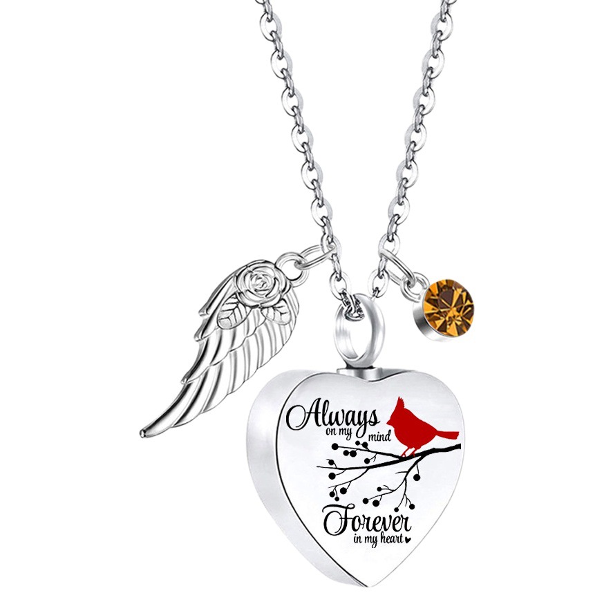 AliExpress de acero inoxidable torcido melocotón en forma de corazón collar de hombres y mujeres de estilo europeo y americano ataúd cinerario letras conmemorativas colgante de amante de mascotas