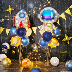 Space-themed glowing table floating balloons birthday party decoration scene children opening ceremony arrangement astronaut