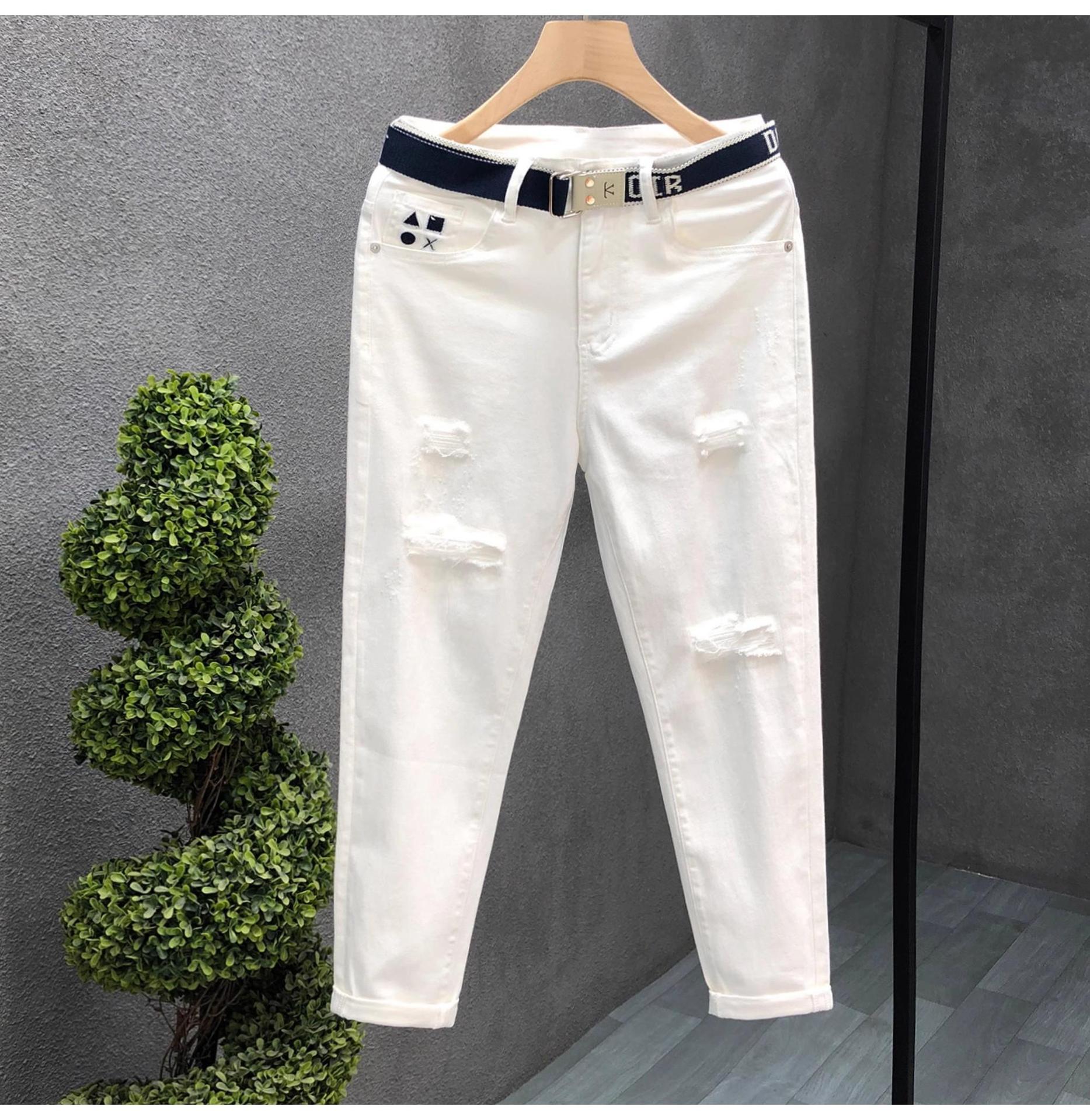 Jeans slim fit uomo denim strappato alla moda per l'estate_voghion.com