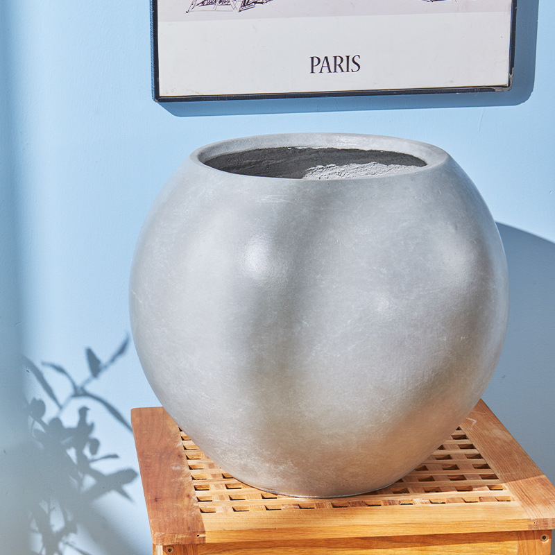 maceta de barro de magnesio esférica, orquídea de goma, recipiente de flores, balcón doméstico, sala de estar al aire libre, cemento verde