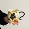 Medieval big-bellied cup-flowers and ink shadows