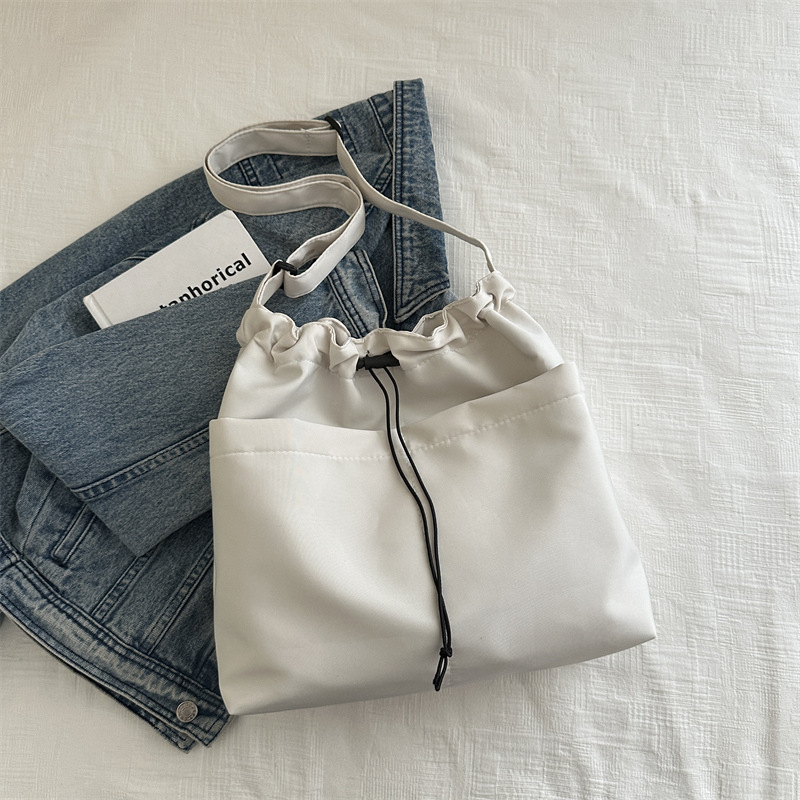 Bolsa de ocio para mujeres 2024 nuevo bolso de tela de verano, bolso de hombro de gran capacidad, bolso de clase, mochila de viaje