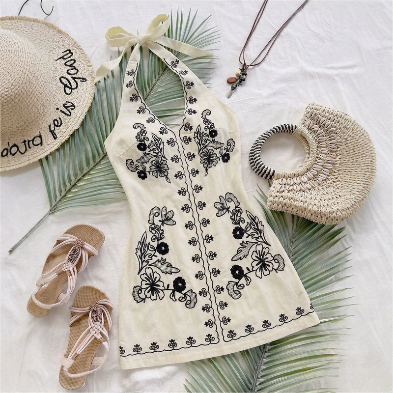 2026 Cross-Border European and American Bohemian Resort Style Short Dress with Floral Embroidery, Tie-Up Backless V-Neck Halter Dress 2026 Cross-Border European and American Bohemian Resort Style Short Dress with Floral Embroidery, Tie-Up Backless V-Neck Halter Dress