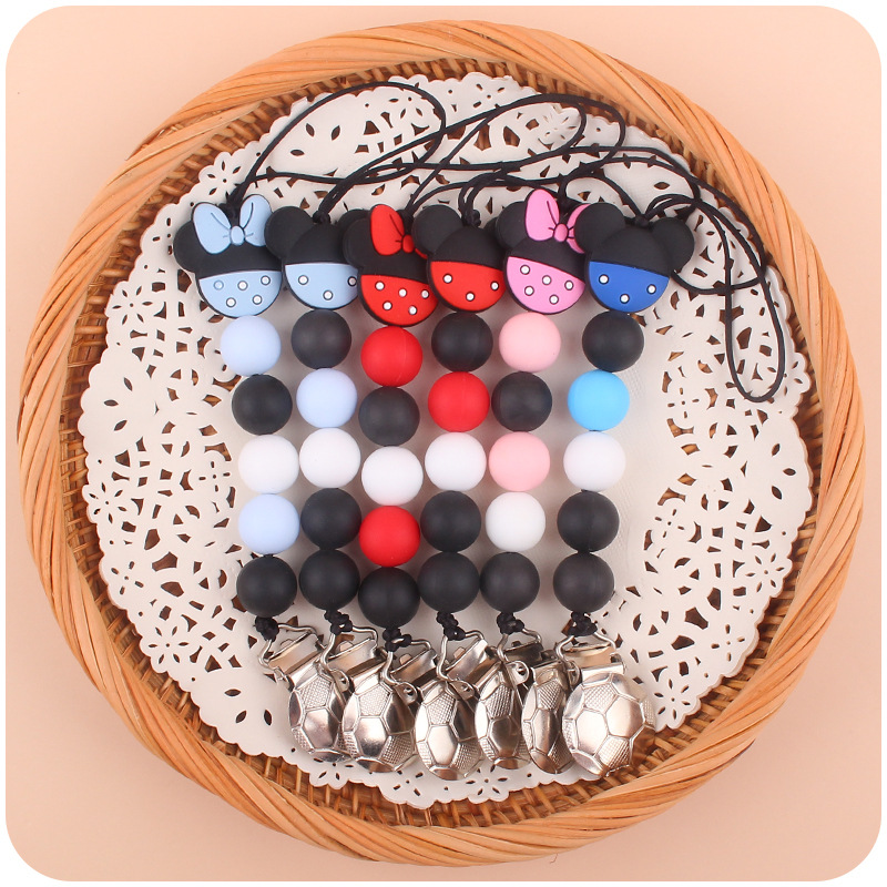 Suministros para bebés forma de fútbol clip de hierro bebé creativo de dibujos animados animal chupete cadena mordedura molar cadena anti-caída