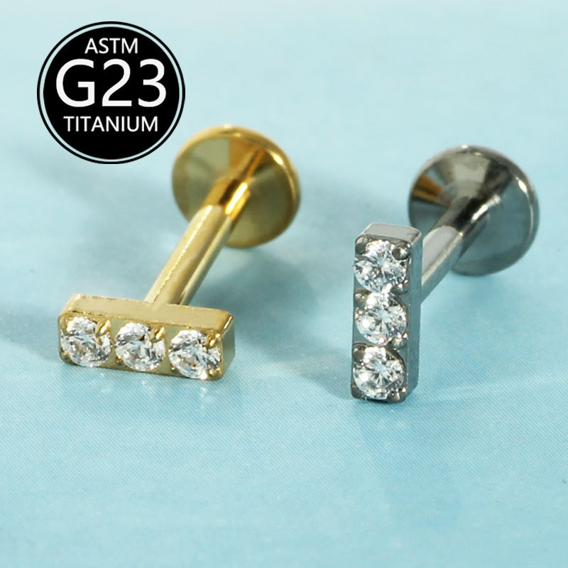 Silver pointed spike labret stud material detail