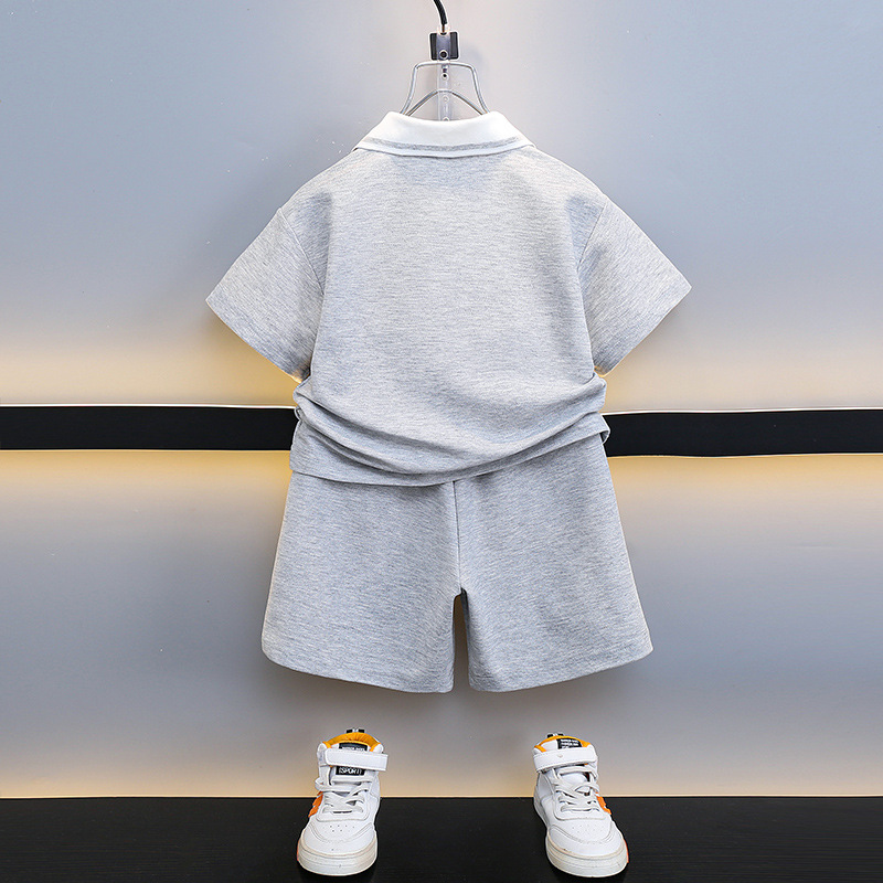 7198 ropa de verano para niños 2025 nuevo traje ropa para niños bebé verano camisa POLO manga corta para niños manga raglán marea