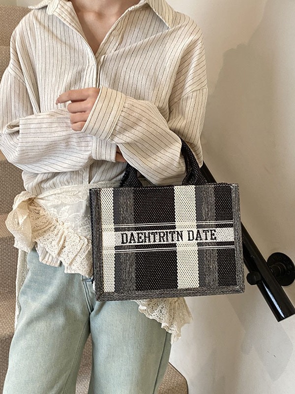 Trend Cross-border del sudeste asiático bolso portátil Tote femenino 2025 nuevo bolso de hombro casual a rayas de tela