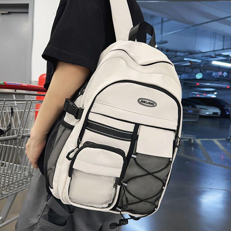 Mochila escolar resistente al desgaste para estudiantes universitarios en clase, mochila simple y versátil para estudiantes de secundaria, mochila de viaje de gran capacidad al por mayor