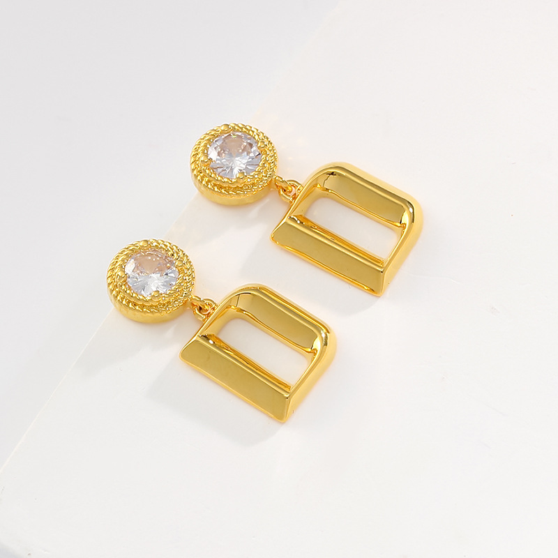 Shiny universal earrings with zircon with letters