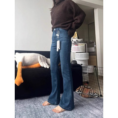 紺色の微ラッパジーパン秋冬の大きいサイズの小さい太った妹のmmはやせているズボンの女性のタイプの高腰のラッパのズボンを現します。