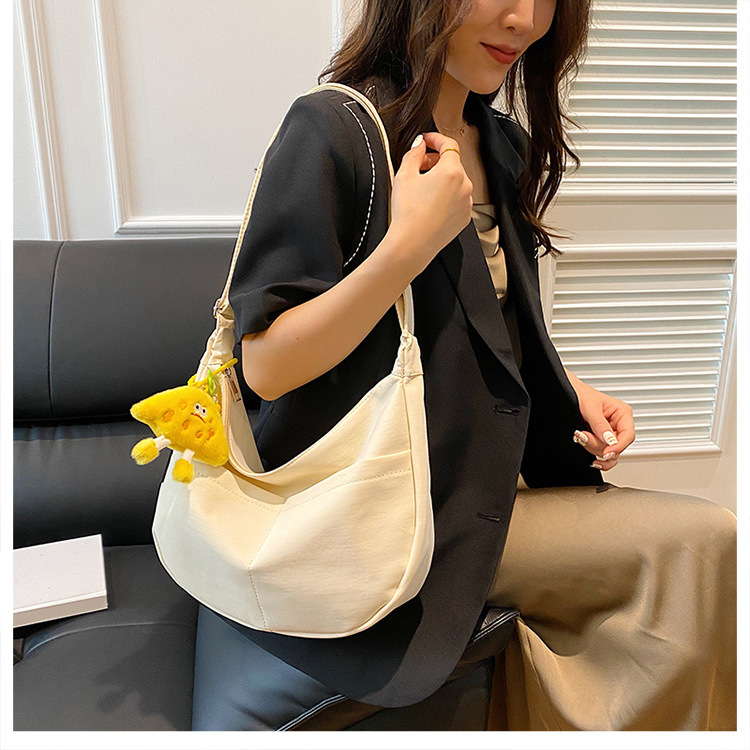 Simple solid-color canvas bag 2024 new style Japanese large-capacity single-shoulder dumpling bag, versatile for school and commuting crossbody bag undefined