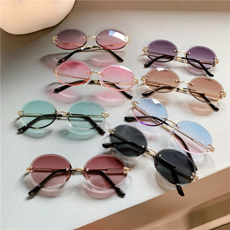 New Sunglasses Women's Oval Gradient Sunglasses Frameless Cutting Edge Trendy Glasses_voghion.com