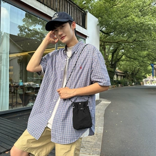 迷你小包包男2024新款时尚抽绳轻便斜挎包女纯色单肩钥匙手机包女
