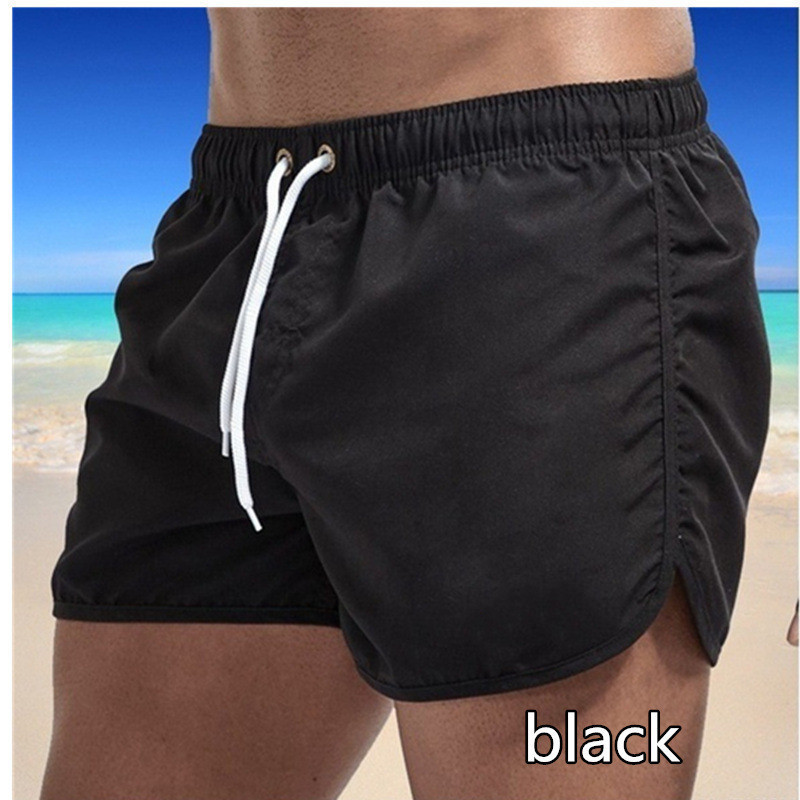 Cross-border Europe and the United States men's solid color three-point beach pants fashion multi-color straight tube loose drawstring sports swimming beach pants