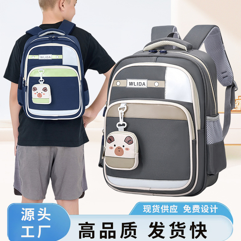 Mochila mayorista para estudiantes de primaria nueva mochila para niños y niñas de grado 1 - 3, mochila ligera para reducir la carga, mochila de ocio resistente al desgaste