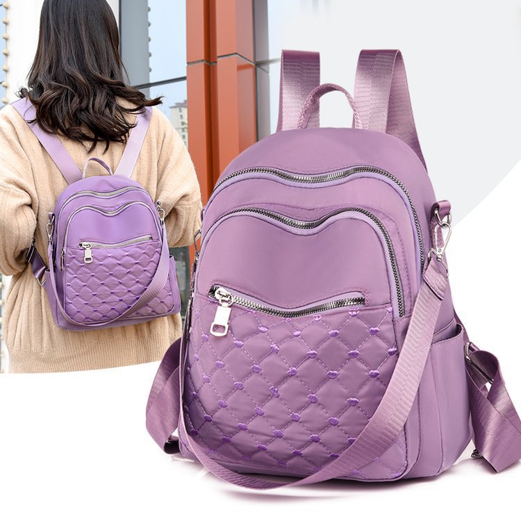 Primavera y verano nueva moda multifuncional de doble uso un solo hombro y doble hombro bordado estilo universitario deportes al aire libre tiro real bolso femenino al por mayor