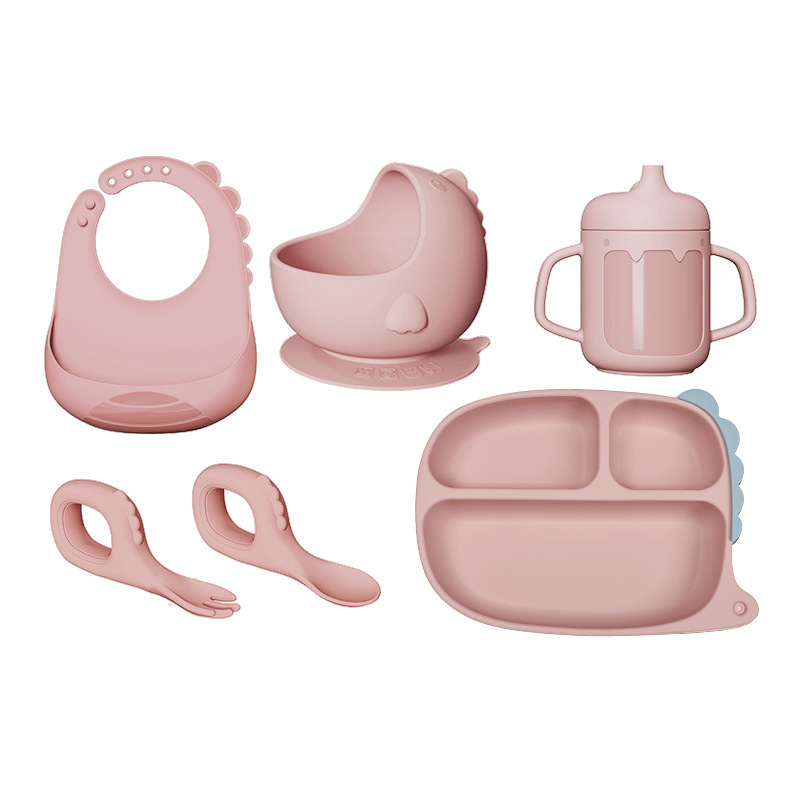 Cuchara de bebé de venta caliente transfronteriza, vajilla para bebés y niños, cuchara de alimentos, tazón de alimentos, juego de vajilla de silicona de dinosaurio de dibujos animados