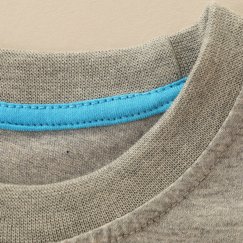 Nuevos productos de otoño Camiseta luminosa de manga larga para niños Camiseta de costura de moda de estilo europeo y americano Camisa de fondo de algodón para niños