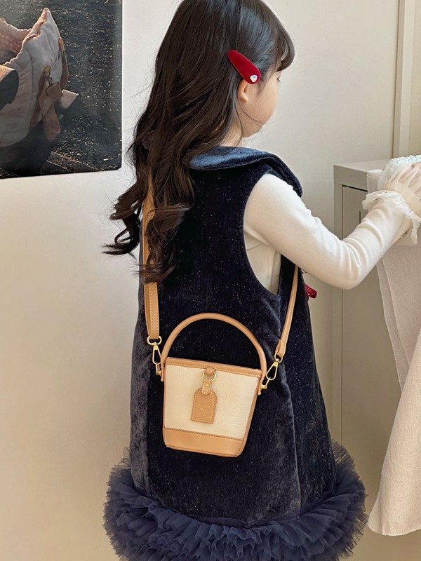 Mini pequeño bolso de cubo de mano para niños 2026 nuevo estilo de alta calidad de moda versátil bolso de mochila de estilo exterior