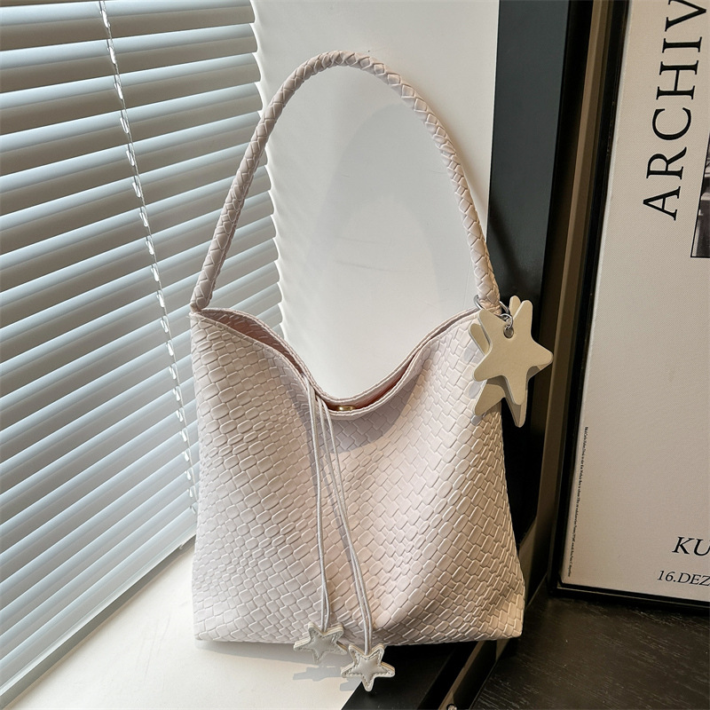 2025 bolso tejido súper caliente para mujer nuevo bolso de axila de un solo hombro de alta gama para mujer bolso de viaje de gran capacidad