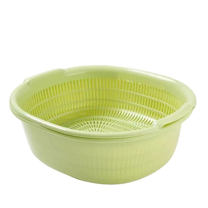 野菜を洗うたらいの米を洗う水たまりの家庭用の台所の客間の二重のプラスチックのふるいの野菜を洗うかごは果物を洗う水たまりのかごを洗います。|undefined