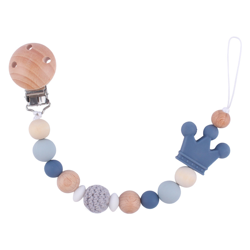 Nuevo bebé suministros Beech chupete clip DIY corona de dibujos animados mordedura de silicona molares chupete cadena anti-caída