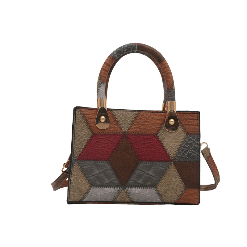 Nueva bolsa de hombro de mujer simple empalme de moda de gran capacidad bolsa de mano PU cuero suave sensación casual portátil ligero