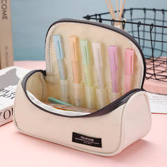 New Korean version simple pure color large capacity multifunctional junior and senior high school pillow style winter melon pencil bag storage bag makeup bag 