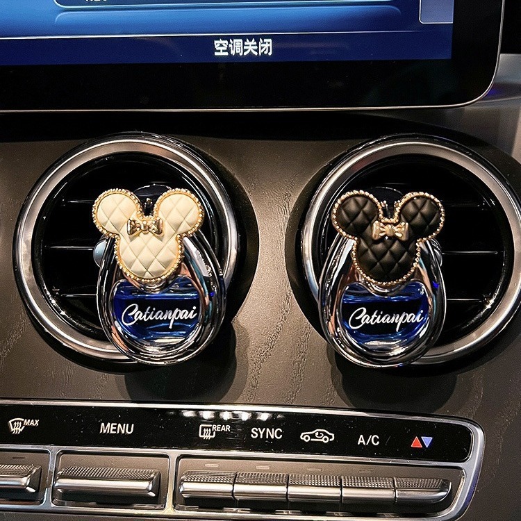 Perfumes de automóviles, salidas de aire, adornos de automóviles
