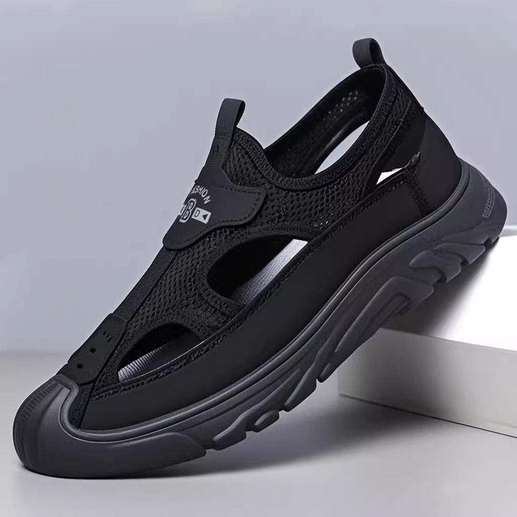 Sandalias Baotou para hombre 2025 verano nuevo estilo malla tendencia zapatos de playa malla transpirable zapatos con agujeros de fondo suave hombres al por mayor