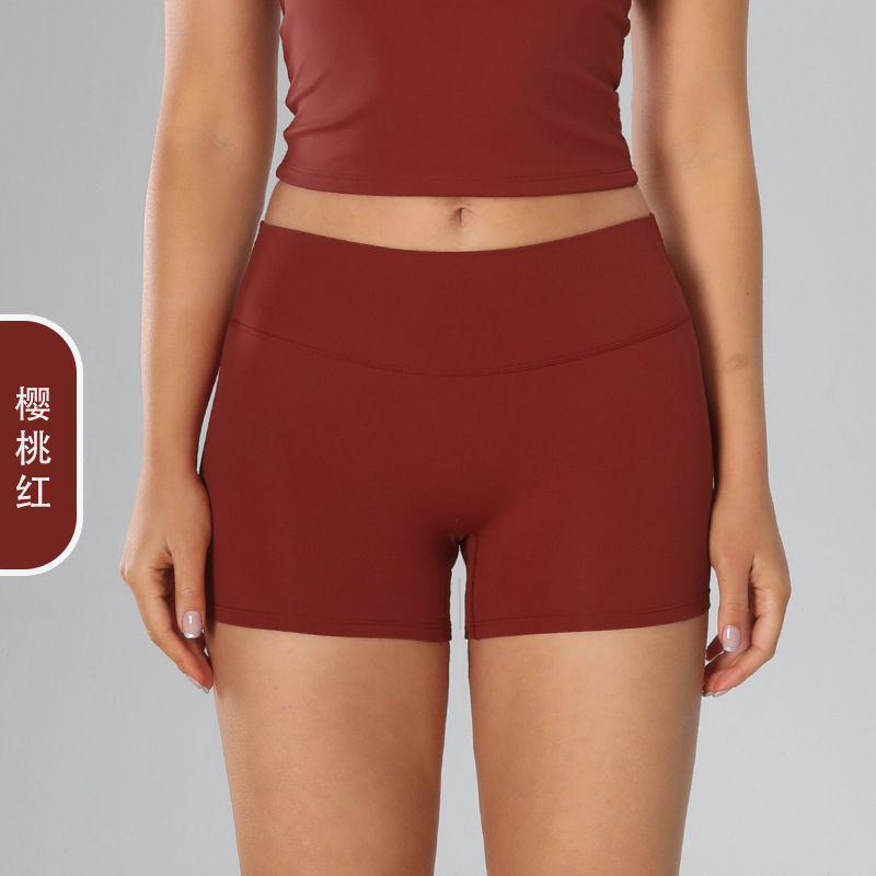 Europa y los Estados Unidos abrasivo transfronterizos pantalones cortos de yoga ajustados de cintura alta para mujeres pantalones de gimnasio abdominales para elevar las caderas para correr pantalones cortos deportivos 8519