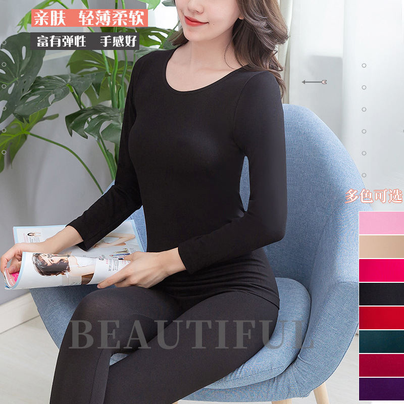 Ropa interior térmica de alta elasticidad con retención de calor de tres segundos para mujer, conjunto de top y pantalón de cuello redondo de color sólido, delgado y cálido para invierno, a la moda.