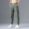 Green silk trousers