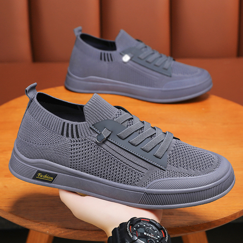 Zapatos de hombre 2026 primavera de moda zapatos casuales zapatos de tela de malla un pedazo zapatos planos suela suave al por mayor transfronterizos