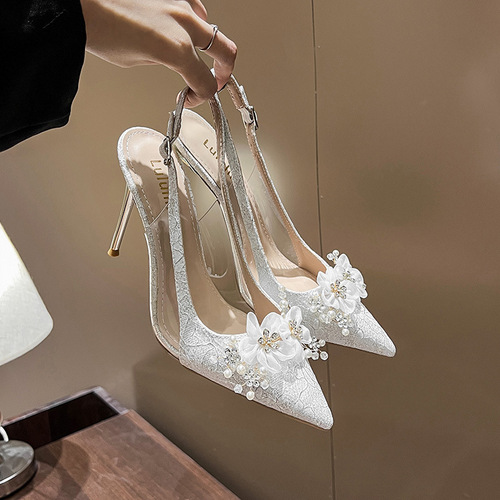 French-style golden bridal wedding shoes: stiletto heels with pointed toes, low-cut design, adorned with floral rhinestones, and featuring a chic open-toe back for women.